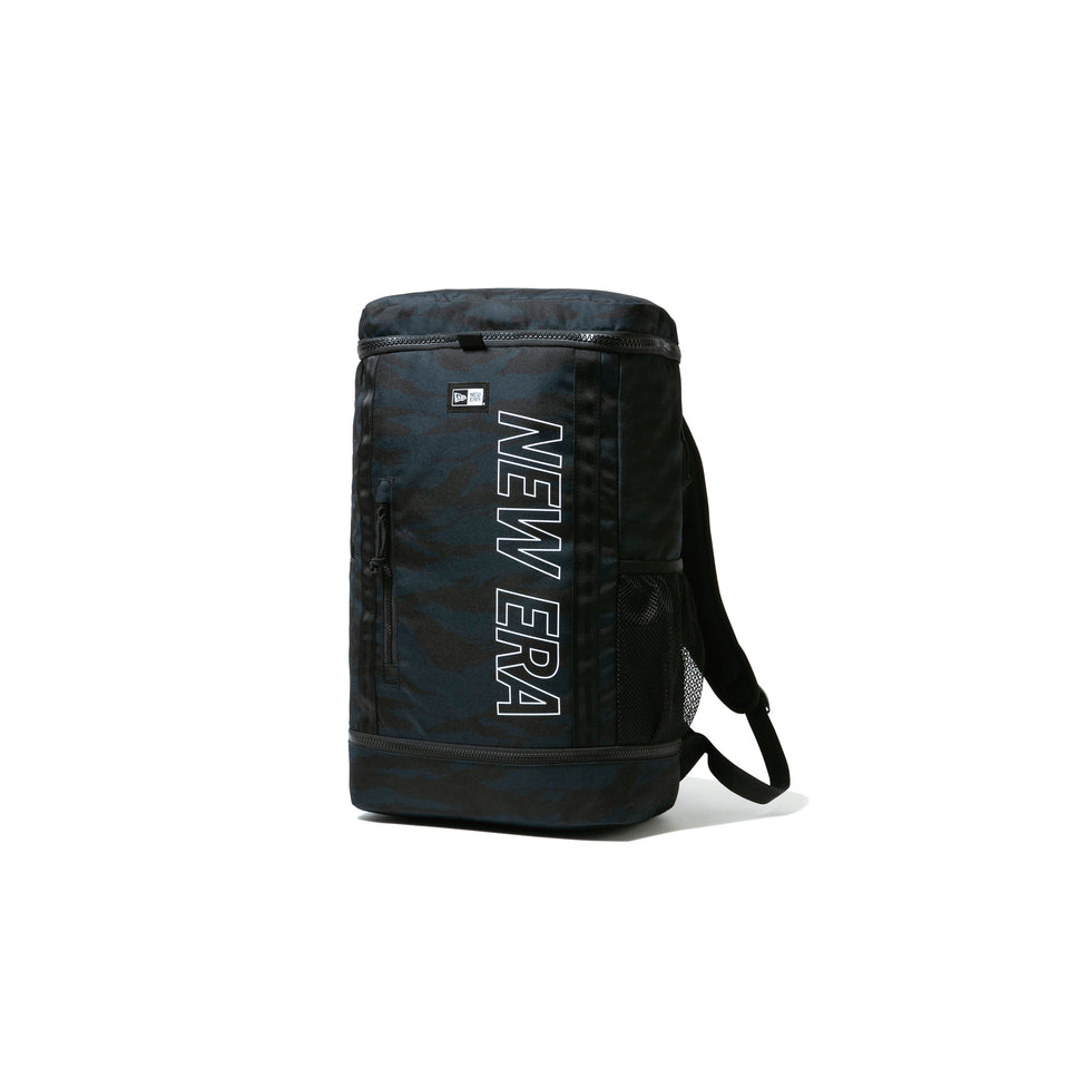 ボックスパック 32L プリントロゴ タイガーストライプカモネイビー / ブラック