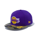 59FIFTY Camo Splatter ロサンゼルス・レイカーズ トゥルーパープル ウッドランドカモバイザー - 12589202-700| NEW ERA ニューエラ公式オンラインストア