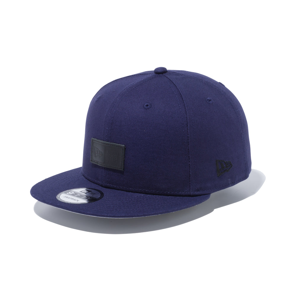 9FIFTY ダックキャンバス レザーパッチ ボックスロゴ ライトネイビー × ブラック